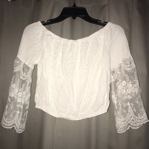 white crop top with lace sleeves